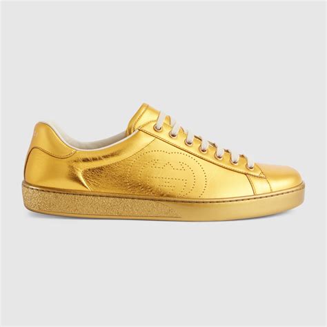 gucci black and gold shoes|gold gucci sneakers.